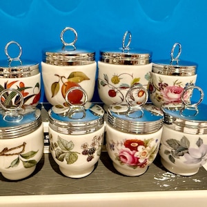 Choice of Vintage  Royal Worcester Egg coddlers: Evesham, June Garland, Woodland, Bournemouth, Strawberry Fair, Grainger Imari  and Louise.