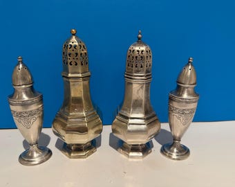 Choice of silver-plated sugar casters  or muffineer and saltshakers