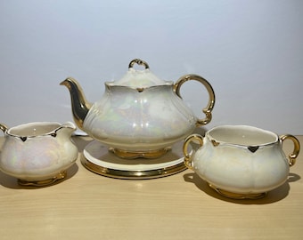 Vintage Ellgreave Burslem Tea Set: Tea Pot, Trivet, Creamer and open sugar bowl.Mother of pearl tea set. Made in England