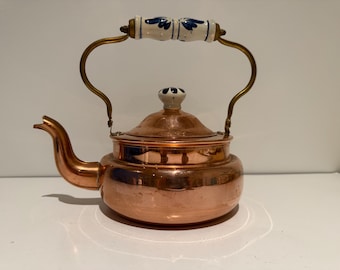 Vintage Copper and Brass kettle with Delft porcelain handle and lid knob.