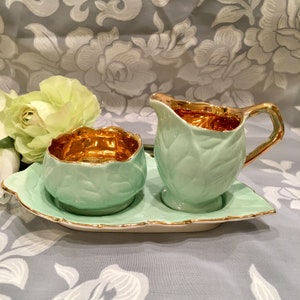 Vintage Royal Winton creamer and sugar bowl on a tray