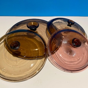 Choice of different sizes Pyrex Amber and Cranberry colour glass lids  Pyrex 624-c,  V-1-C, V1.5-C, 623.C