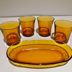 MCM set of 4 Duralex glasses and an oval dish. Made in France.