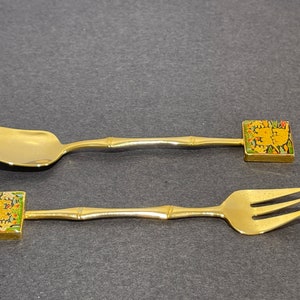 Set of a dessert spoon and a fork. New in a box