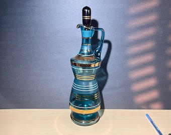 Mid Century Bohemian blue glass decanter decorated with gold stripes