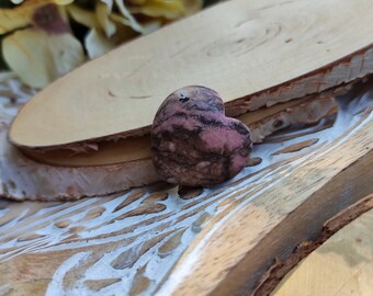 Rhodonite heart gemstone palm stone