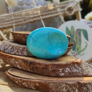 Turquoise zorgsteen edelsteen handvleier