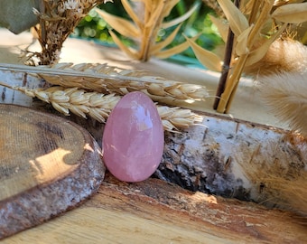Rose quartz egg gemstone hand flatterer