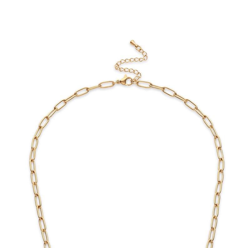 May include: A gold-colored chain necklace with an adjustable length. The necklace features a series of elongated oval links. The clasp and the adjustable chain are also gold-colored. The necklace is displayed against a white background.