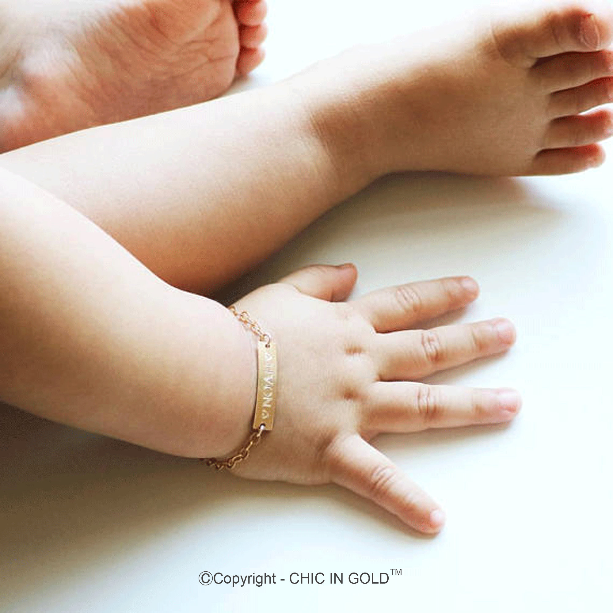 Gold bracelet with shop name for baby