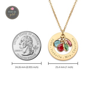 May include: Gold necklace with a round charm engraved with the names "John", "Isabella", "Mia", and "Charlotte". The charm has four colorful gemstones hanging from it. The necklace is shown next to a US quarter for size comparison.