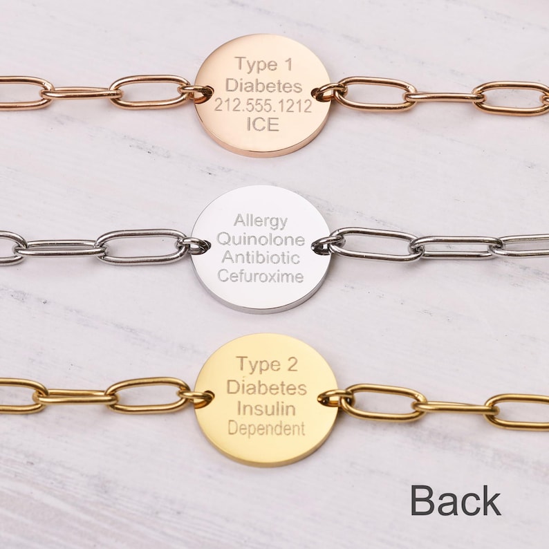 May include: Three medical alert bracelets with different metal finishes. Each bracelet features a circular tag with engraved text. The top bracelet is rose gold and says "Type 1 Diabetes". The middle bracelet is silver and says "Allergy Quinolone Antibiotic Cefuroxime". The bottom bracelet is gold and says "Type 2 Diabetes Insulin Dependent".