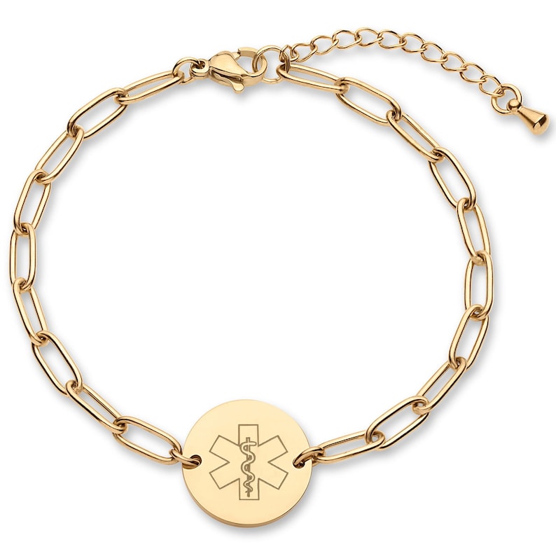 May include: Gold-toned medical alert bracelet featuring a chain link design. A circular charm displays the Star of Life symbol, a six-pointed star with a serpent and staff. The bracelet has an adjustable length.