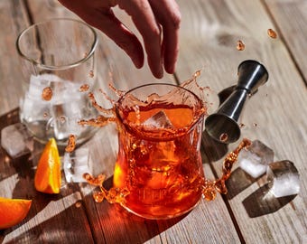 One handmade Aperol Spritz upcycled drinking Glass with expertly crafted rims.