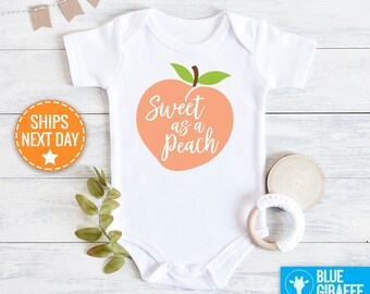 baby clothes with peaches