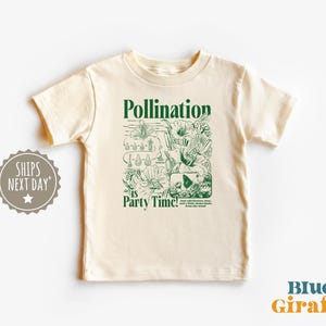 May include: Cream-colored t-shirt with a green graphic that reads "Pollination is Party Time!" and features illustrations of flowers, bees, and other elements of pollination. The shirt is from Blue Giraffe.