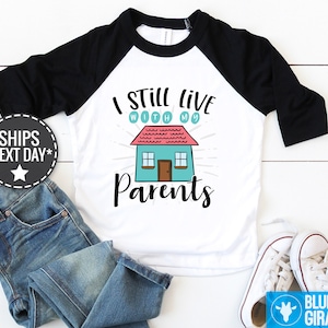 I Still Live With My Parents Raglan Shirt, Funny Baby Clothes, Cute Baby Onesie®