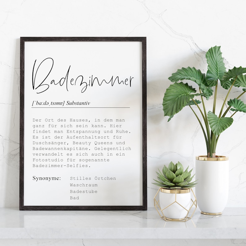 May include: A black and white printable poster with the German word "Badezimmer" which means bathroom in English. The poster defines the word and lists synonyms like "stilles &Ouml;rtchen", "Waschraum", "Badestube", and "Bad".
