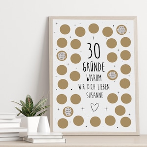 May include: A white poster with a gold heart and 30 gold circles. The poster says "30 Gründe Warum Wir Dich Lieben Susanne".