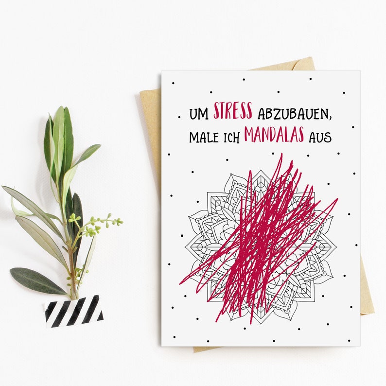 May include: A white card with black polka dots and the text "Um Stress abzubauen, male ich Mandalas aus." A red scribble fills in a black and white mandala design.