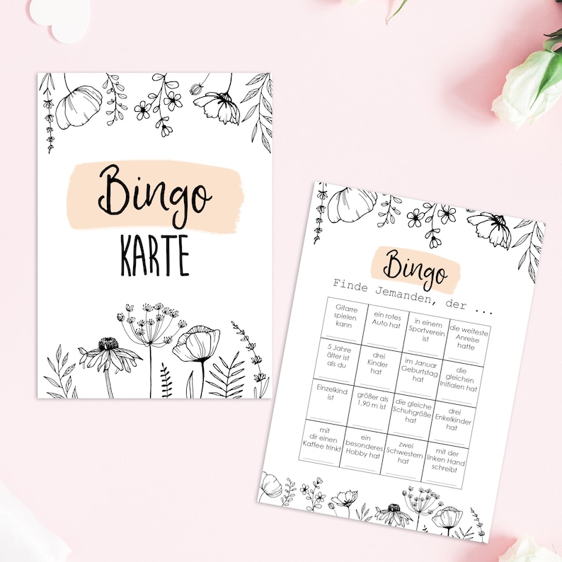 May include: A black and white bingo card with a floral border. The card has a title that says "Bingo Karte". The card has a grid of squares with different prompts for finding someone who meets the criteria. The prompts are in German.