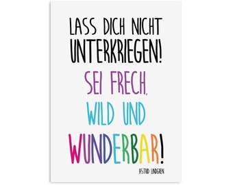 May include: A white rectangular print with black, purple, blue, green, yellow, and pink text. The text reads "LASS DICH NICHT UNTERKRIEGEN! SEI FRECH, WILD UND WUNDERBAR!" and "ASTRID LINDGREN" in a black font.