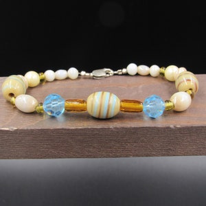 8 Inch Sterling Silver White And Cream Glass Beads Bracelet