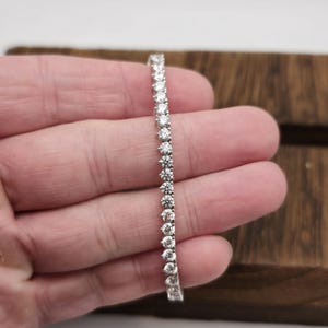 6 Inch Sterling Silver Brilliant Clear Cubic Zirconia Bracelet B100