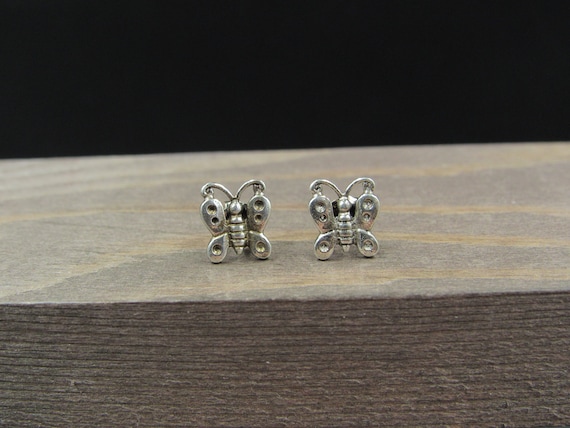 Sterling Silver Tiny Rustic Butterfly Stud Earrin… - image 1