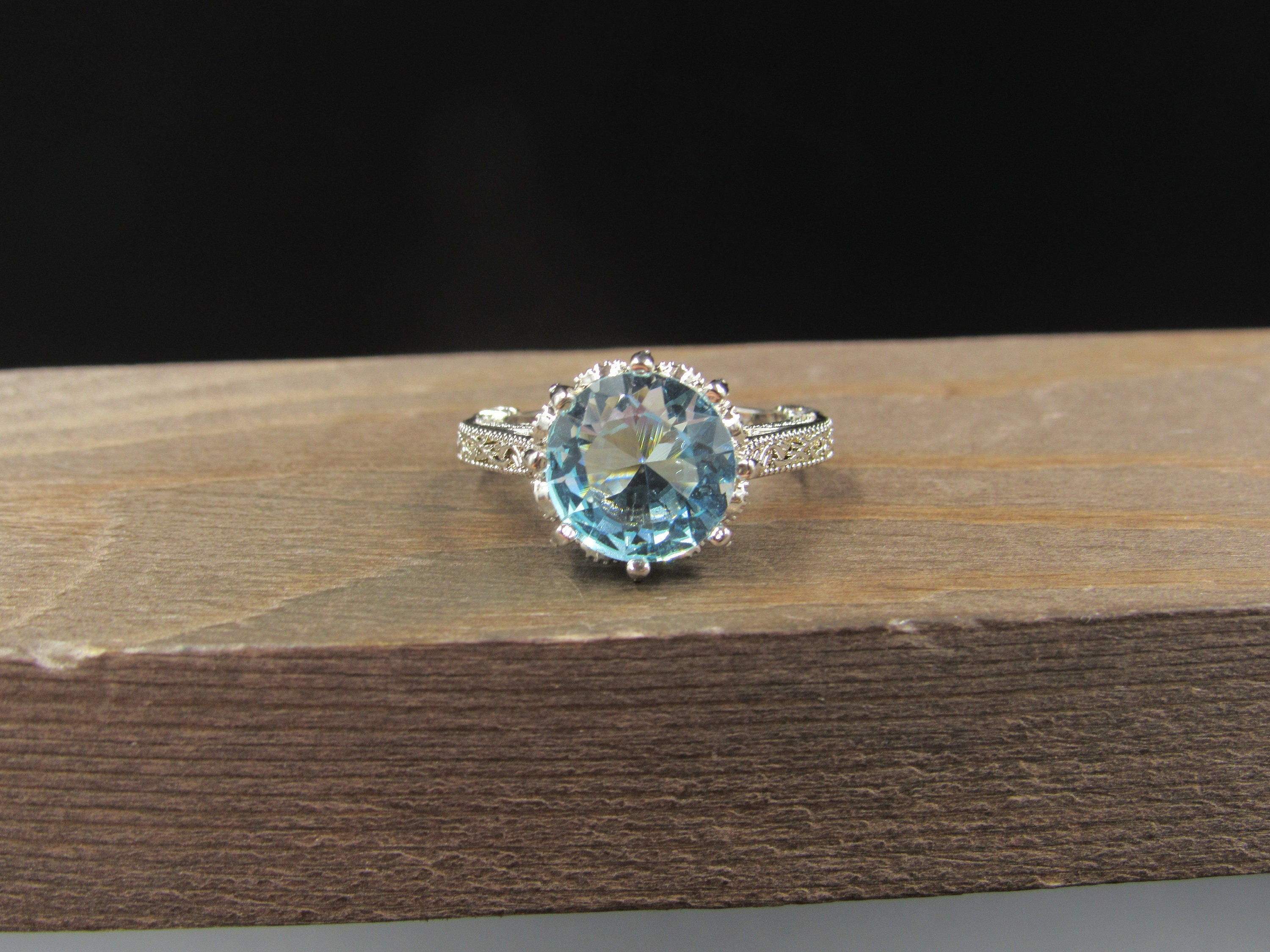 Size 6 Sterling Silver Fancy Cut Blue Round Glass Gem Band