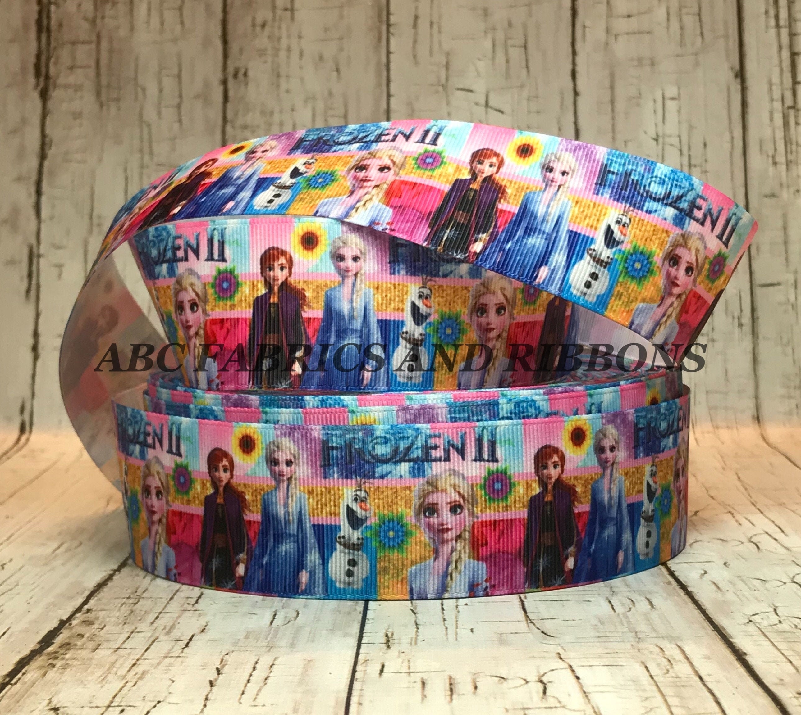 Sold by 5 Yards Frozen Ribbon 1.5 Grosgrain Elsa Anna Ice Princess Anna Movie TV Cartoon Characters Grosgrain Hair Bow Ribbon Sold by 5 Yards Frozen Ribbon 1.5 Grosgrain Elsa Anna Ice Princess Anna Movie TV Cartoon Characters Grosgrain Hair Bow Ribbon