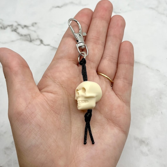 スカルフィジェットチャーム / ジッパープル - Etsy 日本