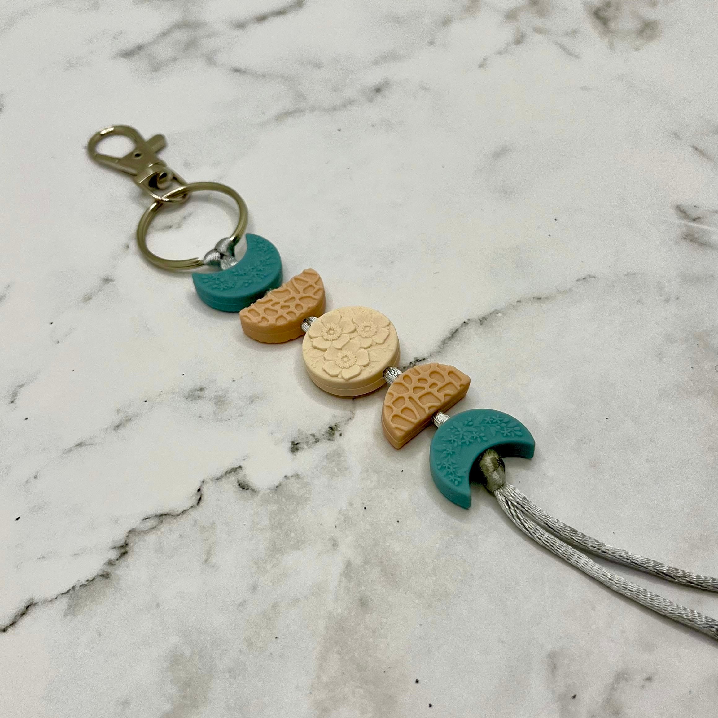 Trans Moon Phases Fidget Keychain