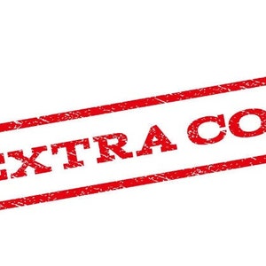 May include: Red rubber stamp with the text "EXTRA COST" in a distressed font.