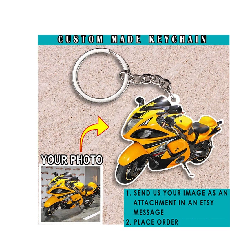 May include: A yellow and black custom-made keychain featuring a motorcycle. The keychain is attached to a silver key ring. The image includes instructions to send a photo to be used on the keychain.