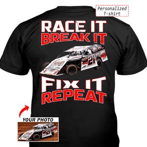 May include: Black t-shirt with a race car graphic and the text "RACE IT, BREAK IT, FIX IT, REPEAT." The shirt also features the text "Personalized T-shirt" and "YOUR PHOTO."