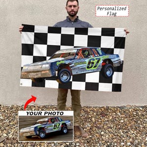 May include: A rectangular flag featuring a black and white checkered pattern background. Centered on the flag is a graphic of a stock car with the number 67 displayed on the side. The text Personalized Flag appears in the upper right corner.