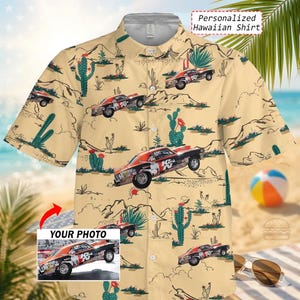 May include: A beige Hawaiian shirt featuring a desert landscape with cacti and race cars. The shirt has short sleeves and a button-down front. The text "Personalized Hawaiian Shirt" is visible on the top right.