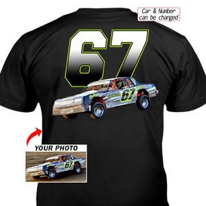 May include: Black t-shirt featuring a race car graphic with the number 67 in large white and green lettering. The text "Car & Number can be changed" is at the top. A smaller image of the car is at the bottom with the text "YOUR PHOTO".