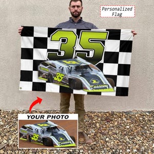 May include: A rectangular flag featuring a black and white checkered pattern background with a large lime green number 35 printed at the top. The center displays a graphic of a silver and lime green race car with the number 35 and the text Lethal.