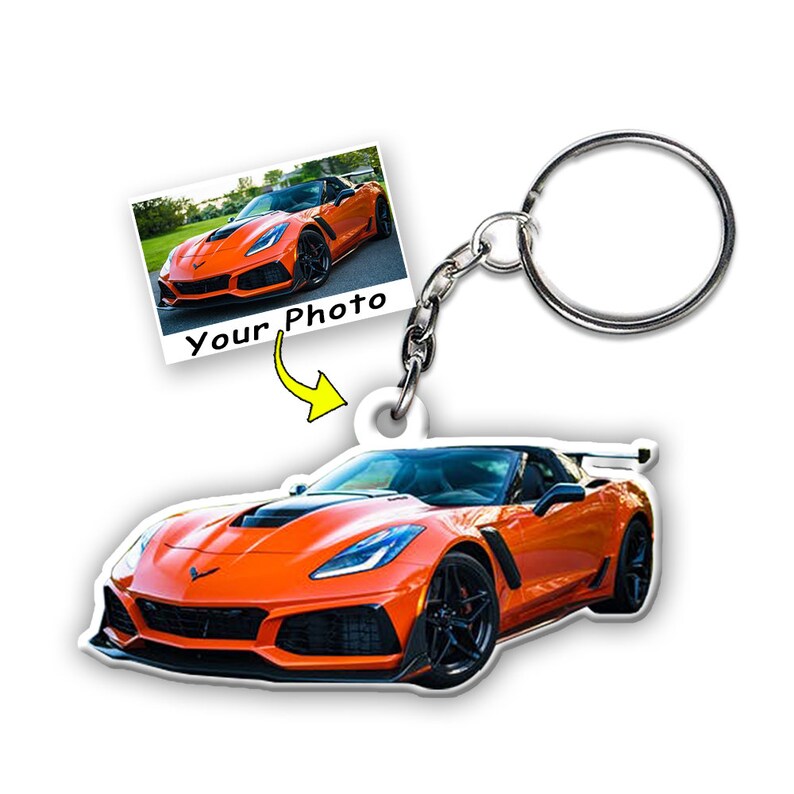 May include: Orange Corvette sports car keychain with a photo frame that says "Your Photo".