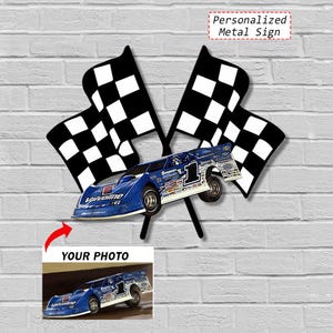 May include: A metal sign featuring a blue race car with the number 1, set against two black and white checkered flags. The sign includes the text "Personalized Metal Sign" and a space for a photo labeled "YOUR PHOTO".