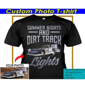 May include: Black t-shirt with a white graphic design that says "Summer Nights and Dirt Track" with a race car image and the word "Lights" in sparkly letters.  The t-shirt is customizable with a photo of your choice.