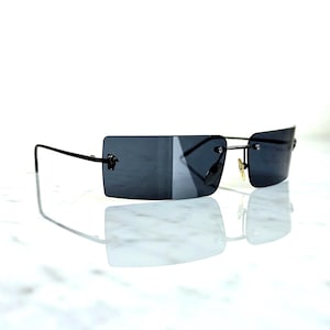 VERSACE Vintage Sunglasses Black Rectangular Rimless Medusa Gray