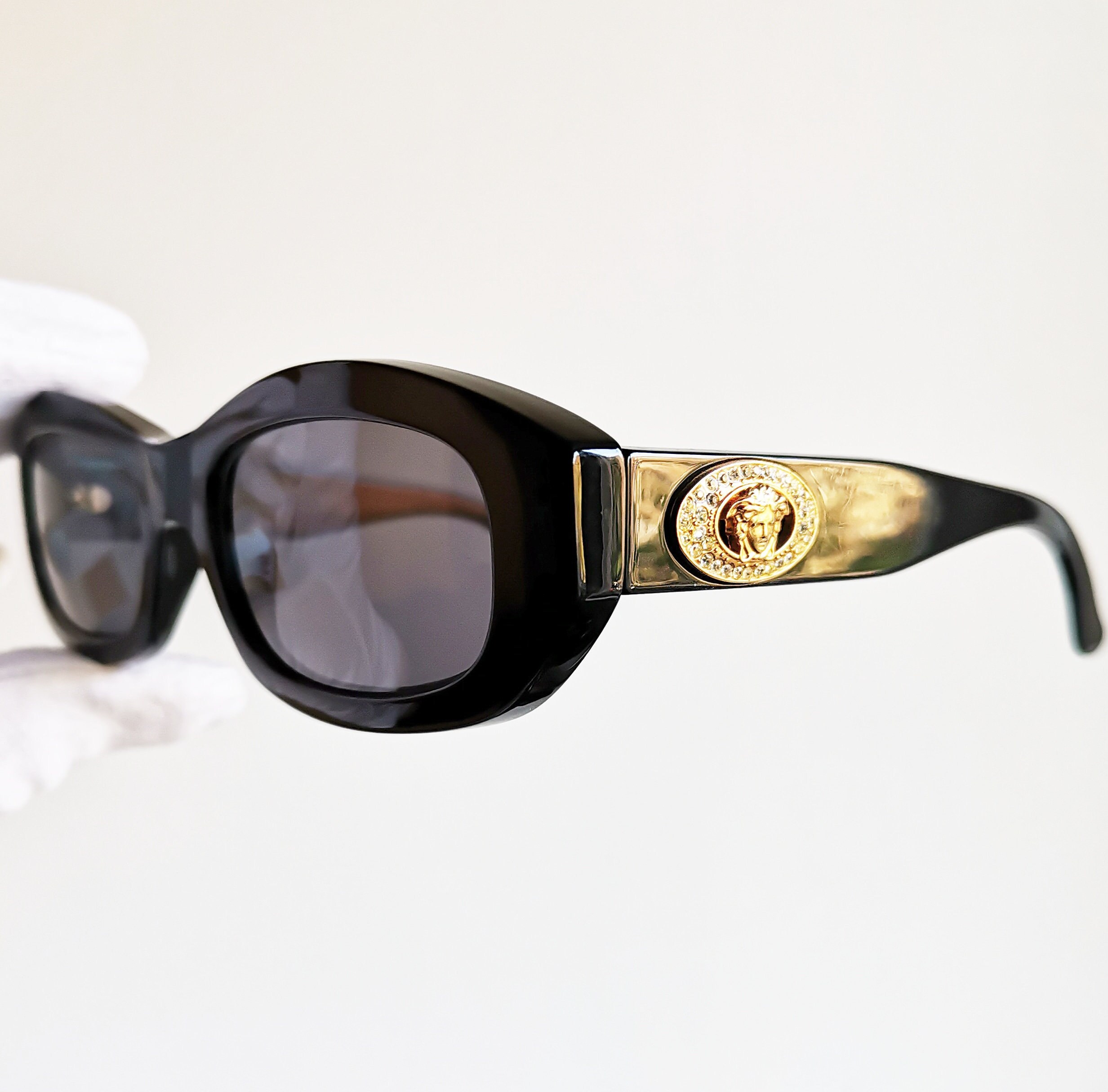 VERSACE Vintage Sunglasses Black Oval Gold Medusa Strass VERSACE Vintage Sunglasses Black Oval Gold Medusa Strass