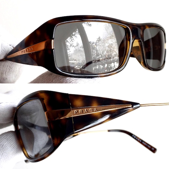 Prada Tortoiseshell Temple Sunglasses with Gold Accents Prada - PR A02S Sunglasses | Specs Collective main image 4