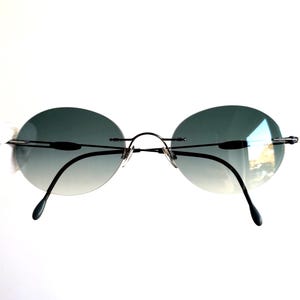SILHOUETTE TITAN vintage zonnebril randloos frameloos zilver klein klein ovaal zeldzaam frame nieuw lichtblauw heldere lens jaren 90 Migos-ontwerper Rihanna
