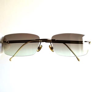 GUCCI sunglasses vintage gold white rimless frameless rectangular oval squared mod goth steampunk Tupac Migos designer Rihanna 90s flat lens