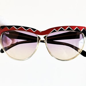 REGINA SCHRECKER vintage sunglasses oval curve geometric aviator black red bolt cateye oversize big odd frame gold logo new purple lens NOS