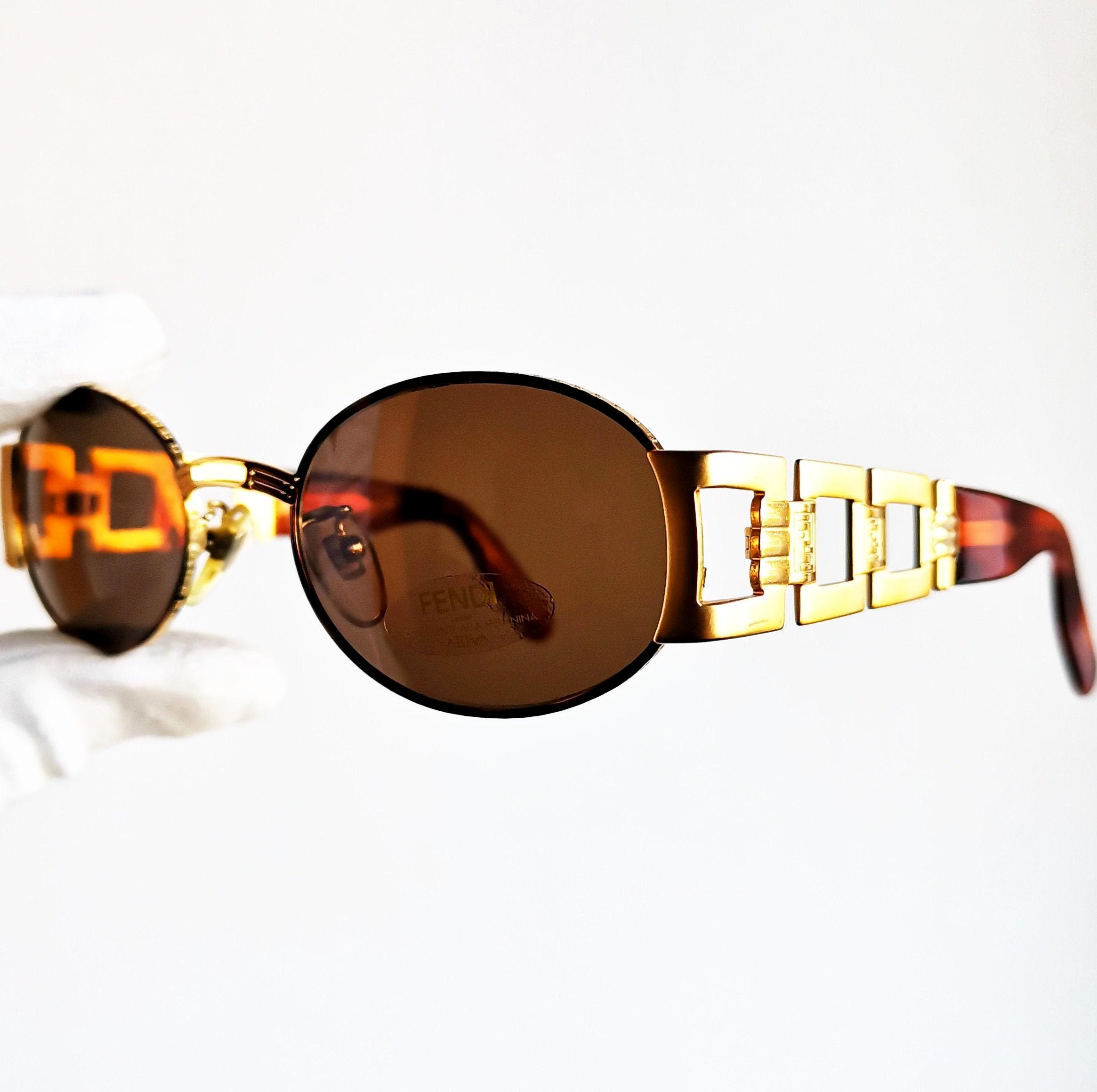 Vintage Fendi sunglasses as seen on Quavo FENDI Vintage Sunglasses Gold Temple Brown 7069 Oval Frame  main image 2